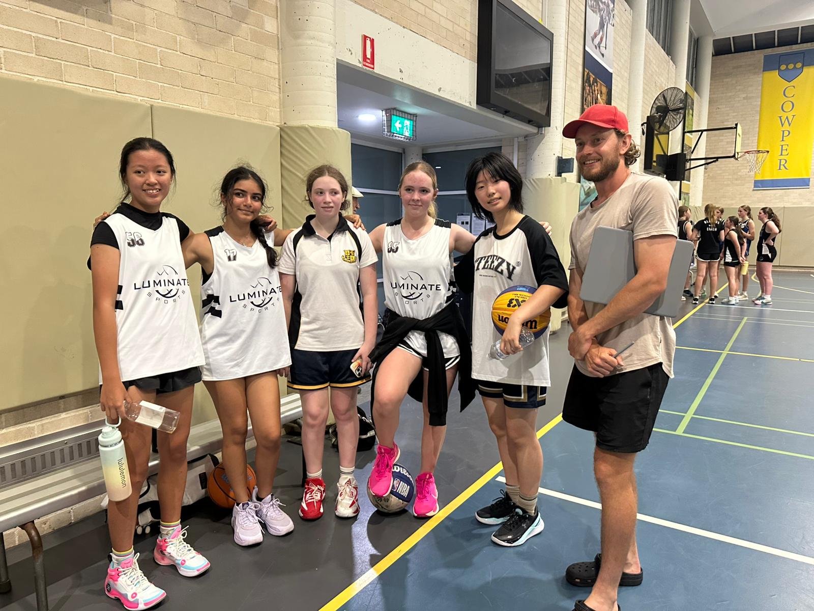 Kids training together on the basketball court